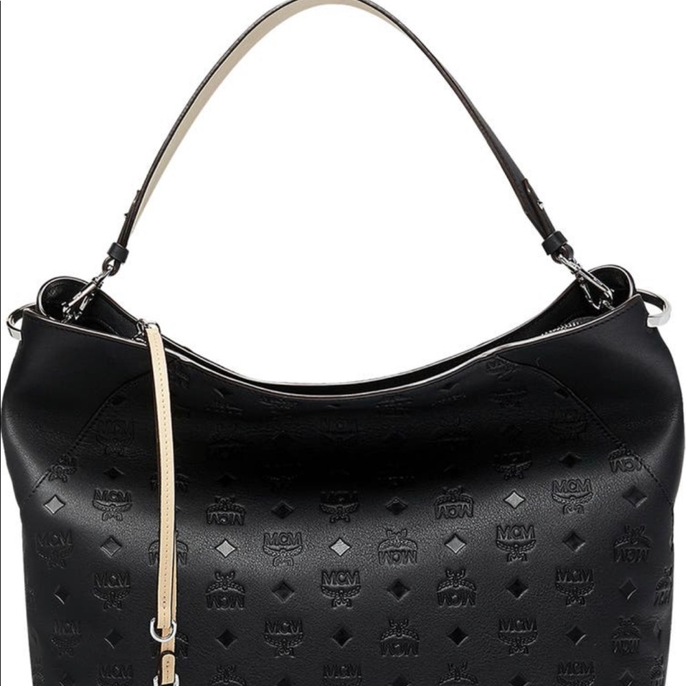 Gently used MCM Large Klara Monogram Leather Hobo.
